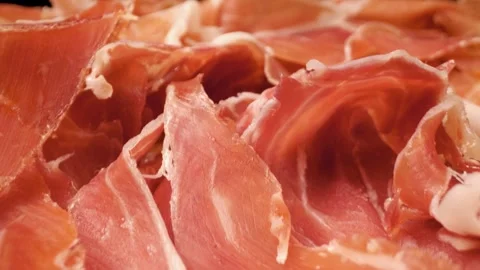 Close-up of Jamon Iberico tapas – the finest Spanish ham. Stock Footage 301446195