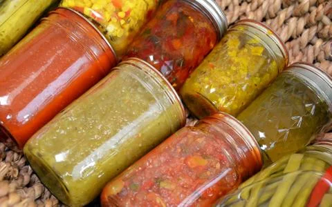 Close up of jars full of pickles Foto stock