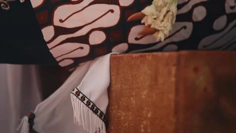 Close-up of Javanese Dancer's Hand and Costume with Jasmine Stock Footage 313477984