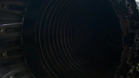 Close-up of a jet engine exhaust nozzle with metal panels and rivets. Stock Footage 318940914