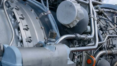 Close-up of the jet engine of a Russian helicopter. An engine for rotating the Video stock 214975409