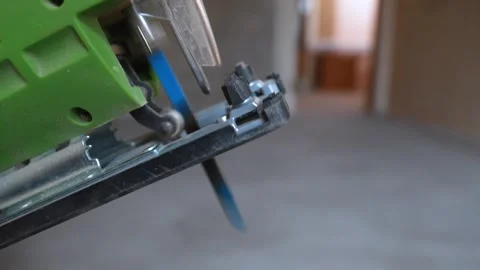 Close-up of a jigsaw power tool with a vibrating blade Stock Footage 329104300