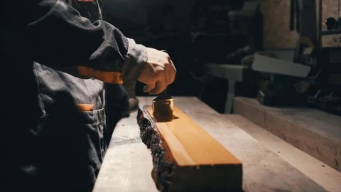 Close-up, joiner uses a brush and oil for wood,oil is used to strengthen the woo 스톡 동영상 78709758