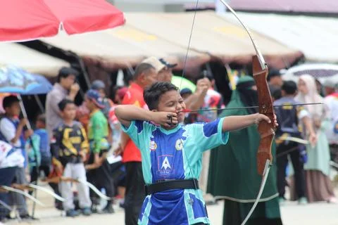 Close Up of Junior Athlete Drawing Bowstring in Archery Stock Photos