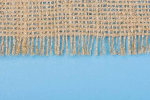 Close up of jute on blue background. Stock Photos