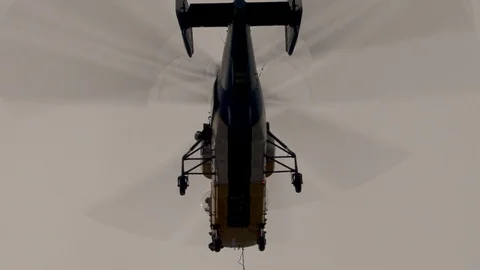 Close-up of Ka-32 helicopter and  operator controlling the work of pilot. Stock Footage 106168963