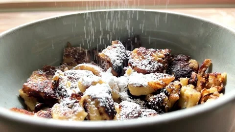Close-up of Kaiserschmarrn Being Dusted with Sugar 库存影片 311996064