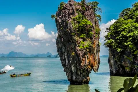 Close-up of karst limestone tower emerging from the Andaman Sea in the vicini Stock Photos