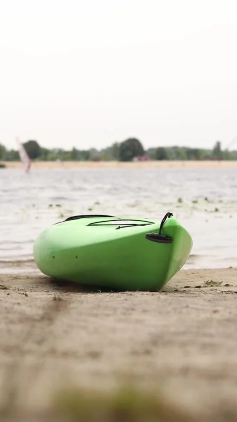 Close-up of a kayak lying on the sand on the beach Stock Footage 314132336