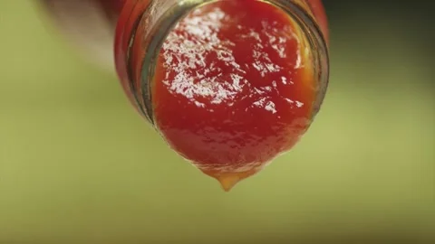Close up of ketchup bottle pour Stock Footage 145920442