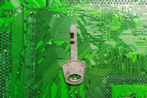 Close up of key on computer circuit board Stock Photos