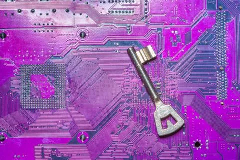 Close up of key on computer circuit board Stock Photos