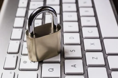 Close key lock on computer keyboard. Stock Photos