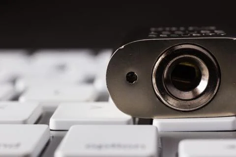 Close up key lock hole on keyboard, dark tone. Stock Photos
