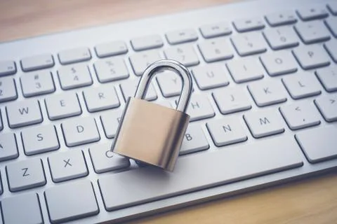 Close key lock on keyboard, blockchain internet system. Stock Photos