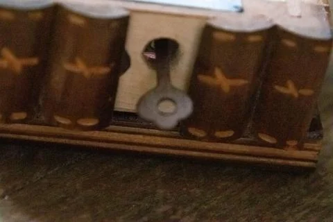 Close up of key secret hide of box. Stock Photos