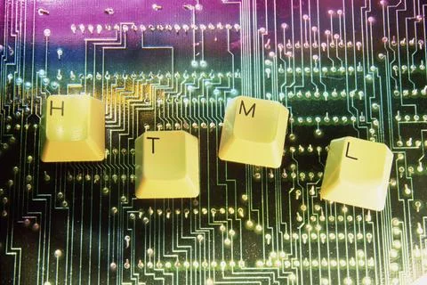 Close up of key spelling HTML on a circuit board Stock Photos