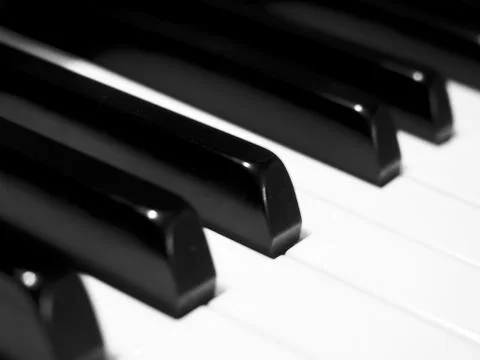 Close up of keyboard of an acoustic classical piano. Stock Photos