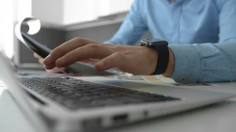 Close-up keyboard and clock hands Stock Footage 104321178