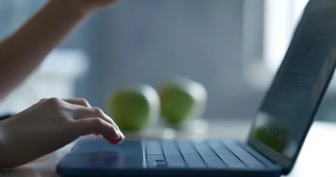 Close up of the keyboard and part of the screen, hands scroll on touchpad Stock Footage 334419434