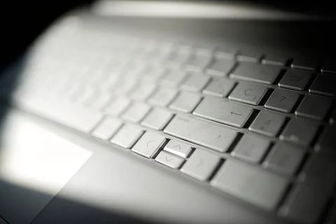Close-up of the keyboard of a gray laptop computer Foto stock