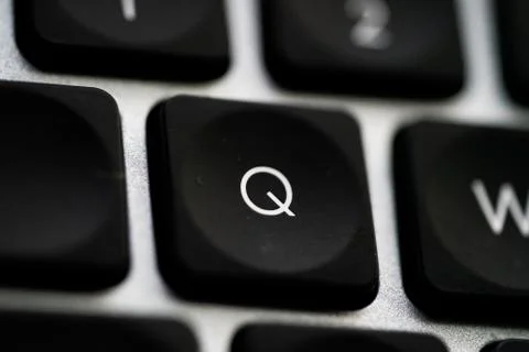 Close up of Keyboard key on space grey metal Stock Photos