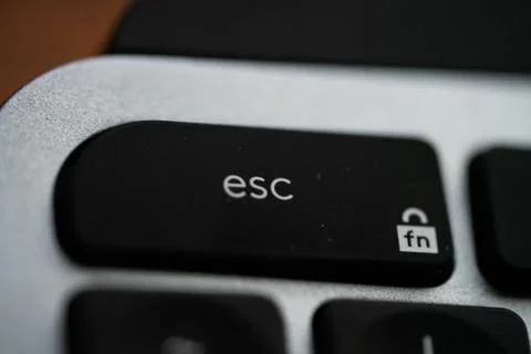 Close up of Keyboard key on space grey metal Stock Photos