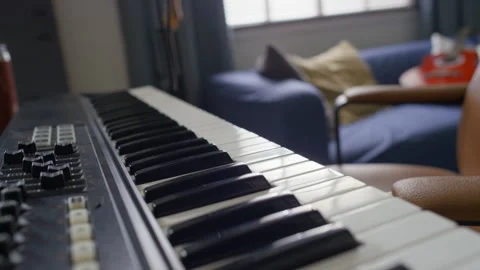 Close-up of Keys and Control Knobs on Musical Keyboard with Blurred Background Stock Footage 314659385