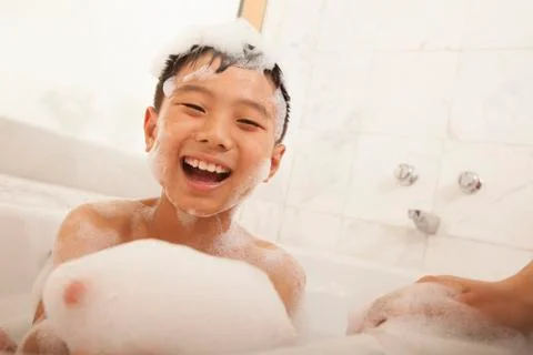 Close-up of Kid in Bubble Bath Stock Photos