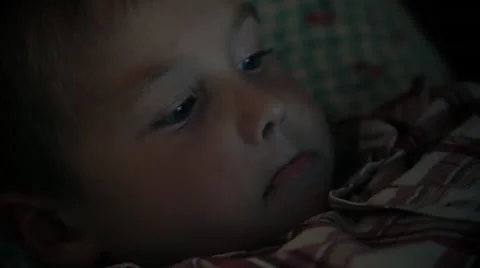 Close-up of kid face looking at tablet computer Stock Footage 68040876