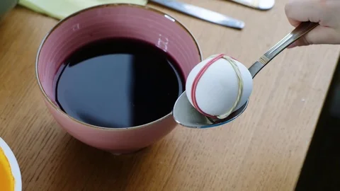 Close up of kid hands coloring easter eggs with egg dye. Stock Footage 123226324