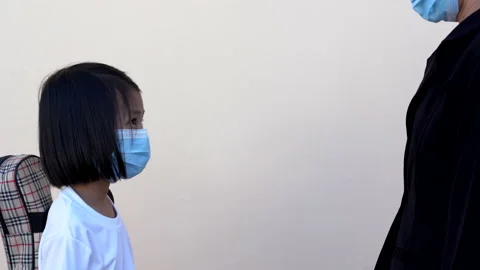 Close up kids checking body temperature by infrared thermometer in hand holding  Stock Footage 132350516