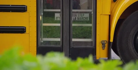 Close up of kids getting off the school bus Stock-Footage 53402547