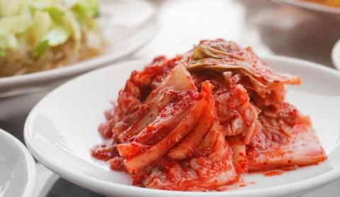 Close up Kimchi cabbage, fermented vegetables,. Traditional Korean side dish. Stock Photos