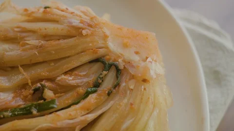 Close-up of kimchi plated over a white plate. Stock Footage 113898054