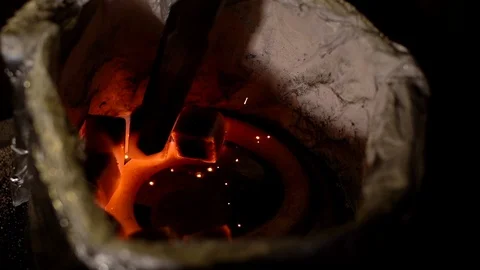 Close-up kindling of square coal for a hookah with a hot spiral in slow motion Stock Footage 108276400