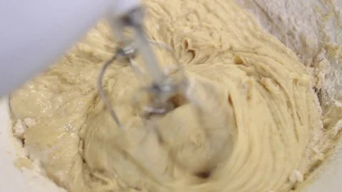 Close-up, kitchen blender blended on the cake dough Stock Footage 120737403