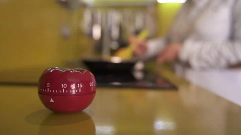 Close-up of a kitchen clock waiting to strike while the chef cooks Stock Footage 130269512