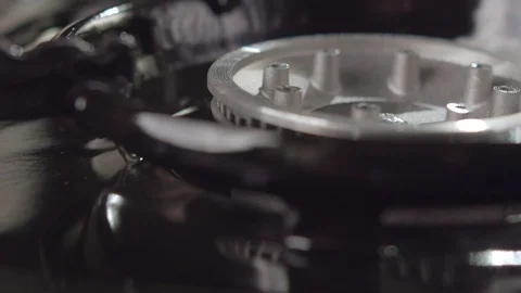 Close-up of kitchen gas stove lights up in blue fire. Slow motion video Stock Footage 114306976