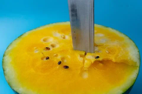 Close-up of a kitchen knife inserted into. Stock Photos