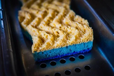 Close-Up of Kitchen Sponge Representing Cleaning, Hygiene and Domestic Routin Stock Photos