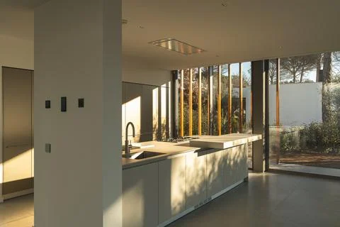 Close-up of kitchen table in a new luxury house with gray and white tones Stock Photos