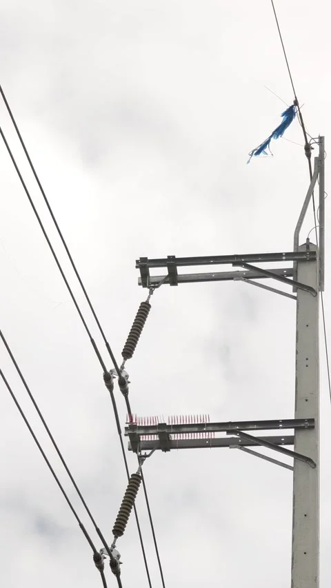 Close up of kite entangled in high voltage power lines causing electrical. Video stock 333392353