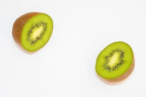 Close up from a kiwi cut in half Stock Photos