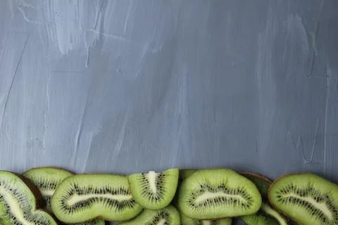 Close-up of kiwi fruit background with space for copy space text. Kiwi slices Stock Photos