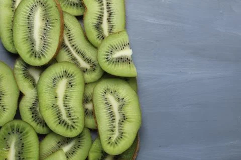 Close-up of kiwi fruit background with space for copy space text. Kiwi slices Stock Photos