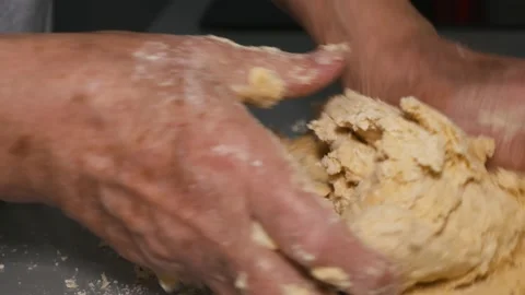 Close-up of kneading dough for making pasta and pizza with their own hands. Mom Stock Footage 166546935