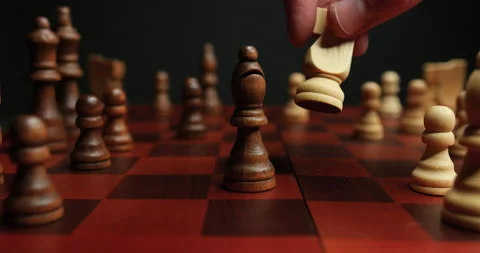 Close Up of Knight Taking Bishop in a Chess Game Stock Footage 236942920