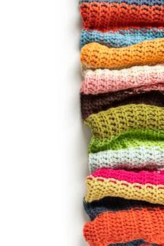 Close-up of knitted wool blanket on white background. Stock Photos