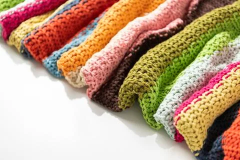 Close-up of knitted wool blanket on white background. Stock Photos